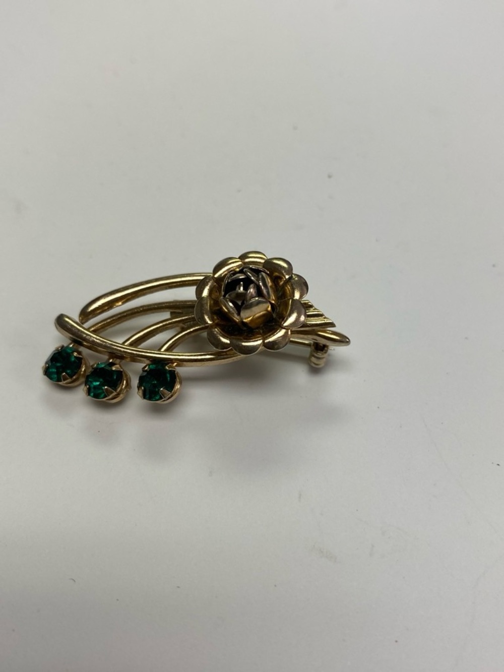 Gold Floral Brooch with Emerald Green Stones